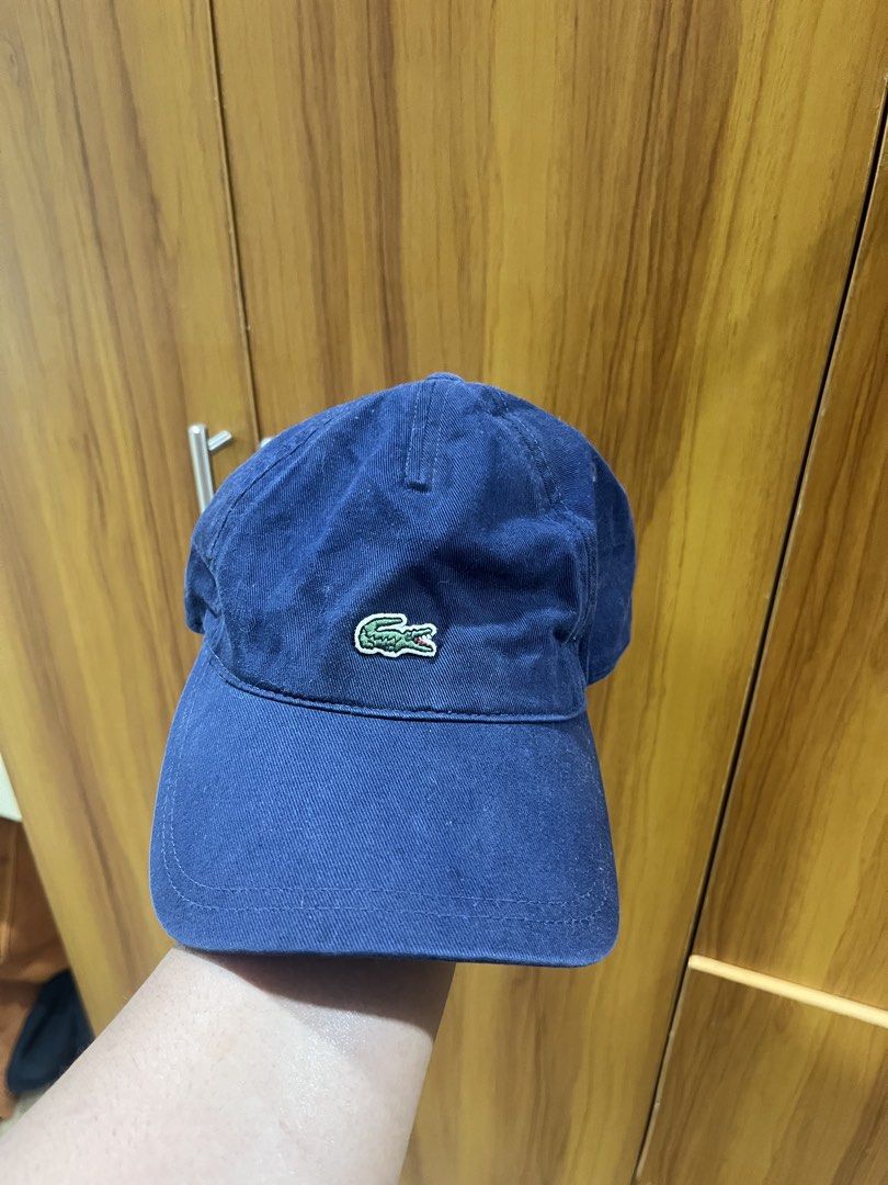 Lacoste RK4814 Navy Cotton Baseball Cap (Category: Caps & Hats) located in Manila. Submitted by christian048 (Listing ID 1469551262, Image 2). Description: - Authentic Lacoste baseball cap in dark navy blue - Style code: RK4814 - 100% premium cotton construction - Classic embroidered crocodile logo on the front - Adjustable metal strapback closure with engraved Lacoste branding - Interior labels complete - One size fits most.