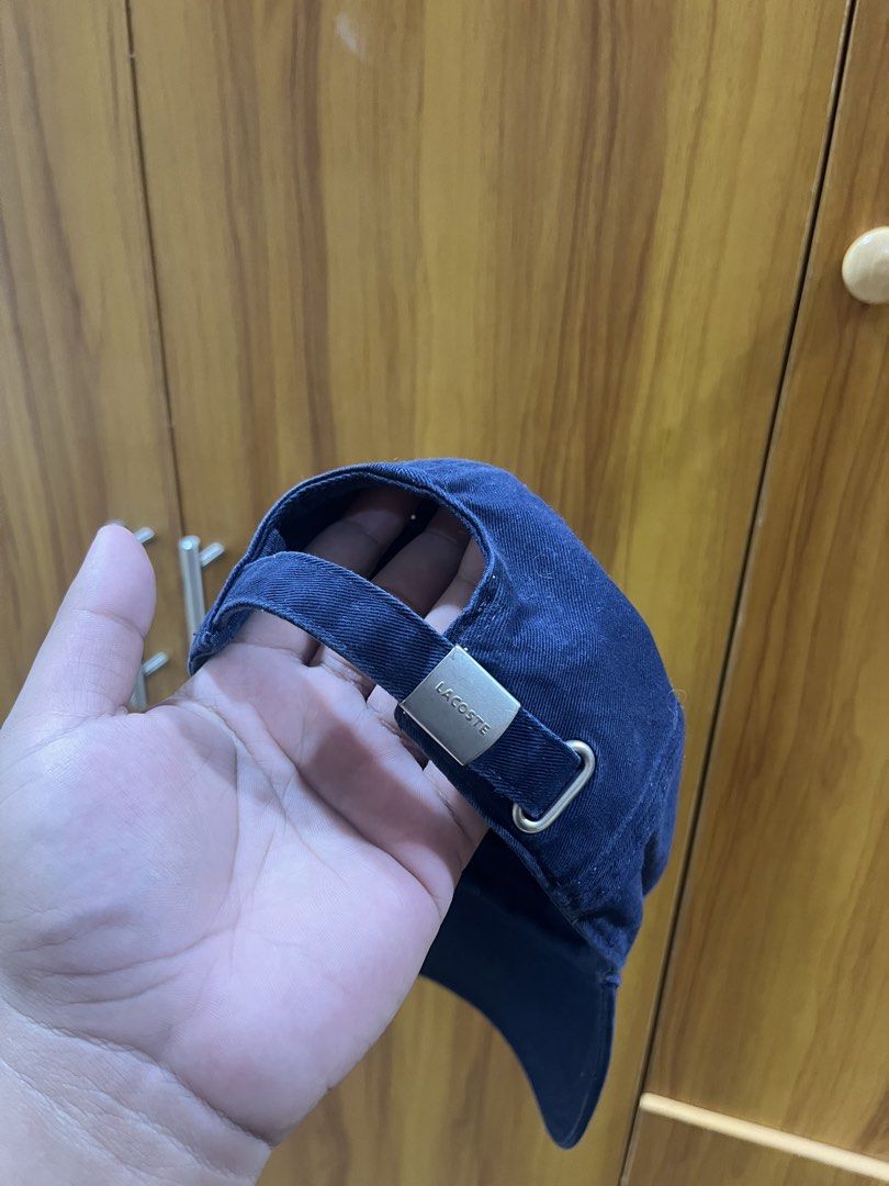 Lacoste RK4814 Navy Cotton Baseball Cap (Category: Caps & Hats) located in Manila. Submitted by christian048 (Listing ID 1469551262, Image 3). Description: - Authentic Lacoste baseball cap in dark navy blue - Style code: RK4814 - 100% premium cotton construction - Classic embroidered crocodile logo on the front - Adjustable metal strapback closure with engraved Lacoste branding - Interior labels complete - One size fits most.