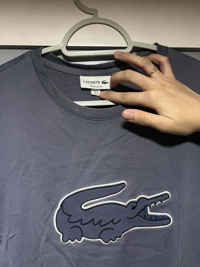 Lacoste Shirt (Category: Tshirts & Polo Shirts ) located in Mandaluyong City. Submitted by santideclutters (Listing ID 1469525002, Image 2). Description: size: 27L 20W (M) color rate: 7.5/10 condition: 8/10 with minimal stains and needs washing COLOR MAY VARY DUE TO LIGHTING.