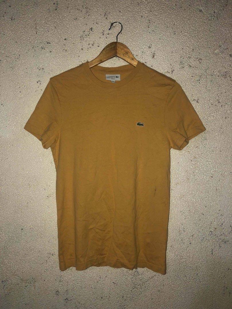 Lacoste Slim Mustard (unisex) (Category: Activewear) located in Cagayan de Oro. Submitted by amenfitt (Listing ID 1469552626, Image 1). Description: Lacoste Slim Mustard (unisex) W 18 L 27 COMPLETE TAGS GOOD CONDITION COLOR RATE 9.5/10 ISSUE: NONE.