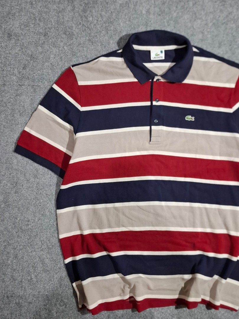 Lacoste Striped Polo Shirt (Category: Tshirts & Polo Shirts ) located in Las Pinas. Submitted by nevergetsold.ph (Listing ID 1469440102, Image 2). Description: Lacoste Striped Polo Shirt Dimentions (inches) Width: 25 Length: 32 Issues: none.