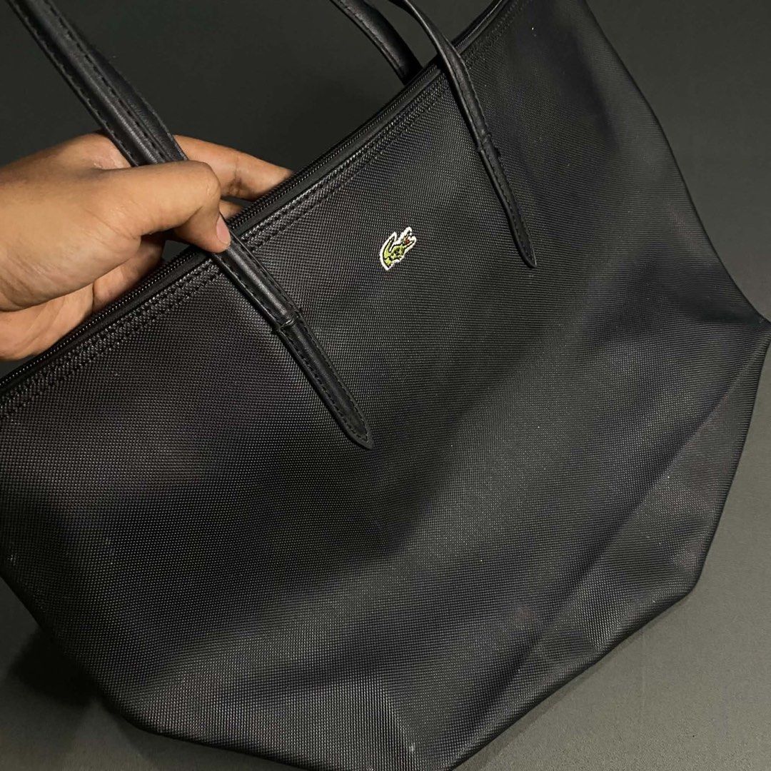 lacoste tote bag (Category: Tote Bags) located in Manila. Submitted by keavera_ (Listing ID 1469571282, Image 3). Description: off/legit 18 width 11 length l@cost3 brand.