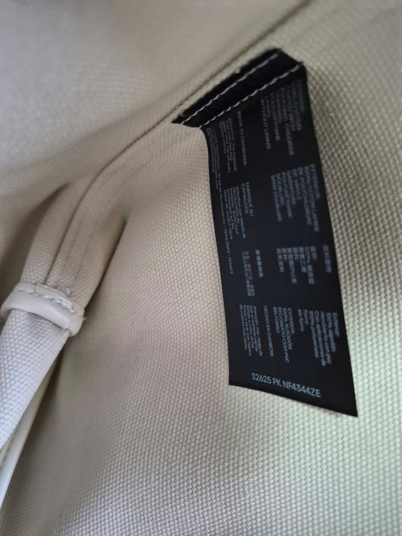 Lacoste Tote Bag NF4344ZE with Pouch (Category: Tote Bags) located in Manila. Submitted by freestone_f18729 (Listing ID 1469569938, Image 2). Description: - Color/Pattern: White with all-over geometric monogram print - Includes: Matching zippered pouch and white dust bag - Design: Double shoulder handles, open top interior, unlined canvas fabric - Origin: Made in Cambodia - Style Code: S2625 PK NF4344ZE - Condition: Brand new and well-maintained 