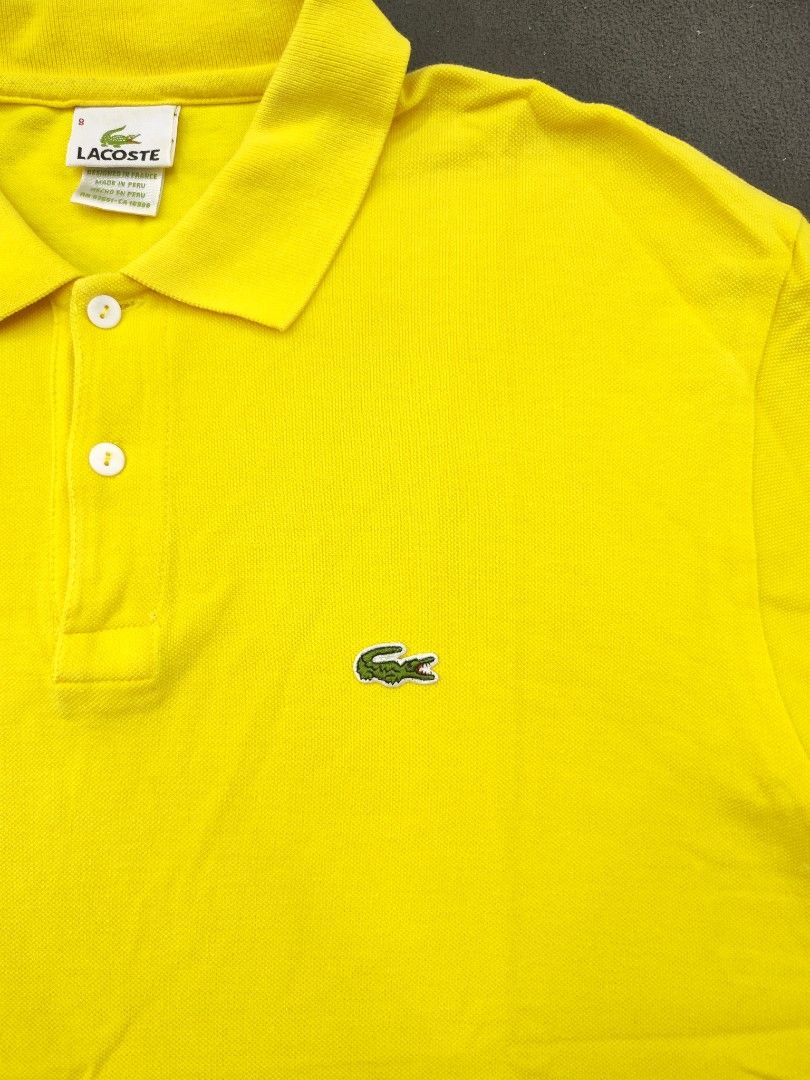 Lacoste Yellow Polo Shirt (Category: Tshirts & Polo Shirts ) located in Bulacan. Submitted by emilj23 (Listing ID 1469435074, Image 2). Description: Lacoste Yellow Polo Shirt Size 8 on tag L 25 W 21.5 Condition 810 Color rate 9.5/10 Issue Multiple Stains.