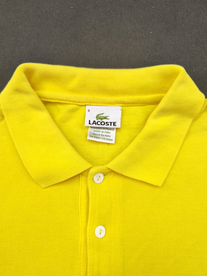 Lacoste Yellow Polo Shirt (Category: Tshirts & Polo Shirts ) located in Bulacan. Submitted by emilj23 (Listing ID 1469435074, Image 3). Description: Lacoste Yellow Polo Shirt Size 8 on tag L 25 W 21.5 Condition 810 Color rate 9.5/10 Issue Multiple Stains.
