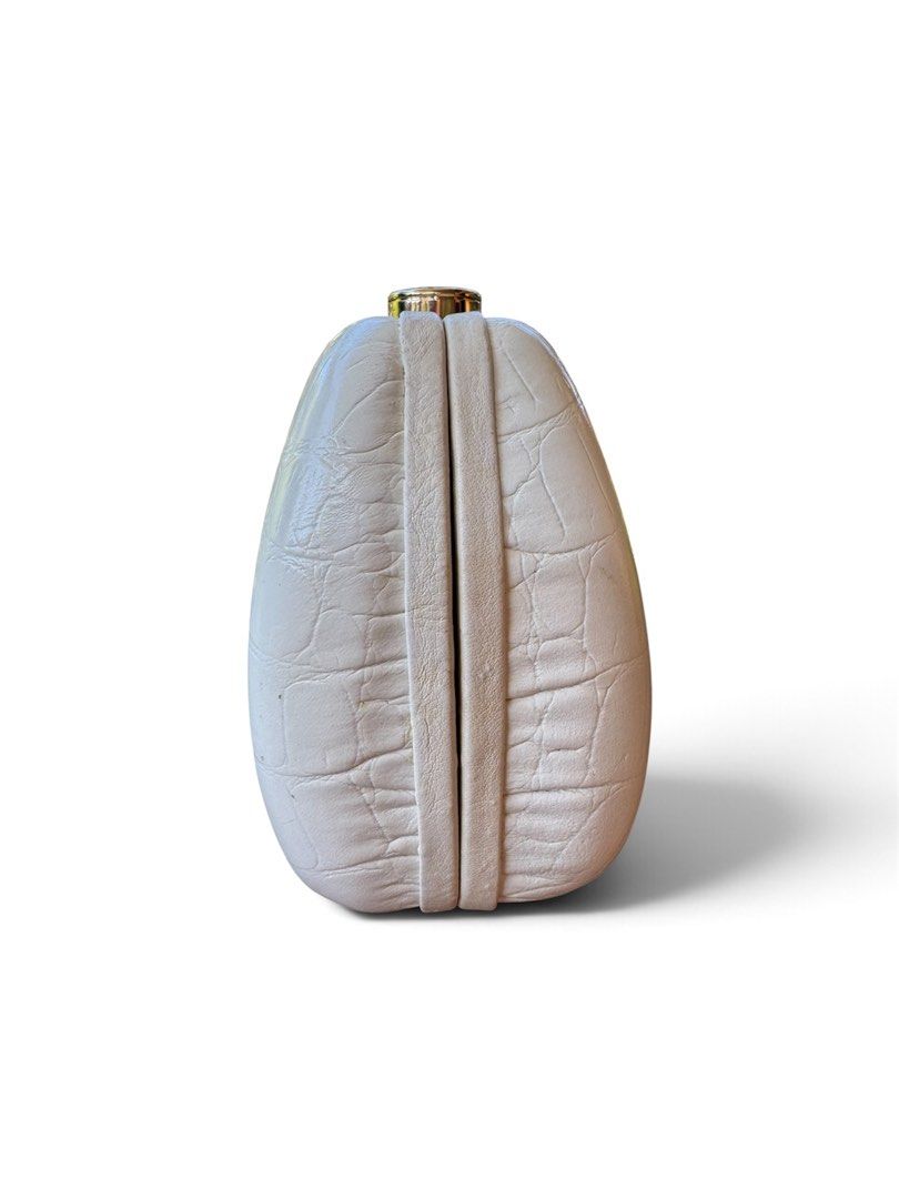 Lancel Paris White Crocodile Embossed Clutch Bag (Category: Clutches) located in Lingayen. Submitted by lux_thrift (Listing ID 1469442818, Image 3). Description: location pangasinan hard shell clutch perfect for wedding and formal events very minor signs of use only promax phones cannot fit no inclusion .