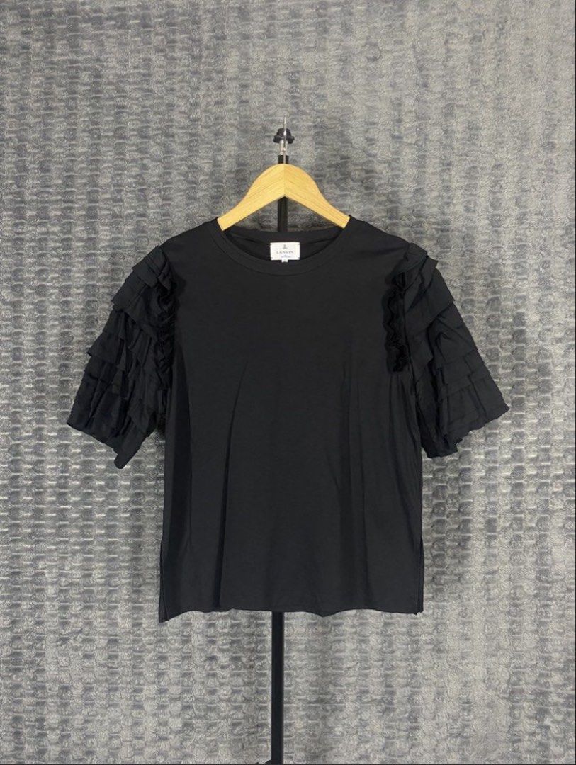 Lanvin En Bleu Frill Sleeve Top (Category: Blouses) located in Bacolod City. Submitted by treasurehunts.6100 (Listing ID 1469528286, Image 1). Description: Lanvin En Bleu Frill Sleeve Top Condition - Excellent Color - Black Color rate - 10 / 10 Material - 100% Cotton No Flaws Size 38 Best Fit - M - L Dimensions : Width - 18 Length / 22.5 Brands you might find on my profile ( Cos, Uniqlo, H&M, Zara, Muji, Ralph Lauren, Hugo Boss, Fred Perry, Lacos
