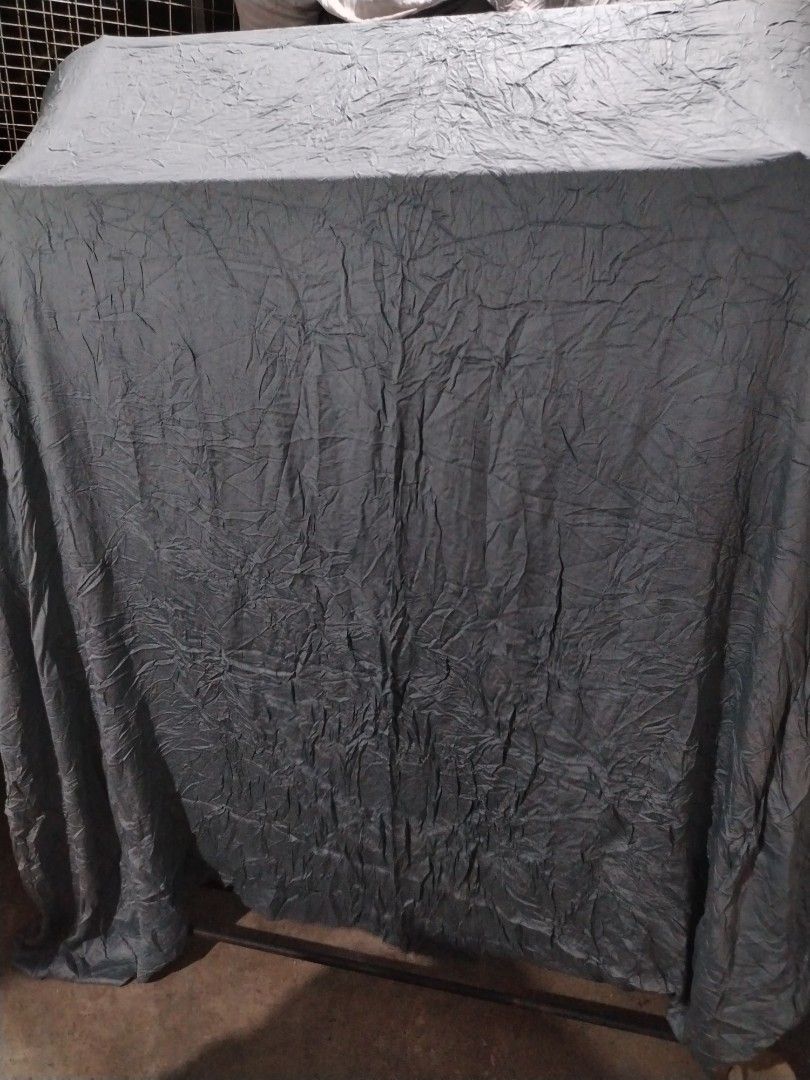 Large grey crinkled textured fabric material sheet drape (Category: Bedding & Towels) located in Manila. Submitted by mimachelleukay (Listing ID 1469519217, Image 1). Description: - Large dark grey fabric with a heavy crinkled texture - Heavy drape style, perfect for furniture covers or backdrops - Creased surface design that covers a wide area - Easy to fold and store when not in use.