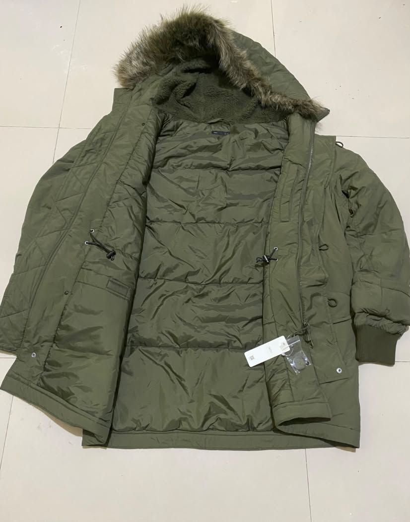 Lativ Puffer Jacket (Category: Coats, Jackets and Outerwear) located in Cainta. Submitted by ohhhhhhlori (Listing ID 1469527330, Image 3). Description: [BNWT] Lativ Olive Green N3B Military Parka / Winter Flight Jacket Size L Brand new with tags! Selling this high-quality, heavy-duty olive green winter parka from Lativ. Designed like a classic military N3B flight jacket, it provides incredible warmth and insulation for extreme cold or winter holi