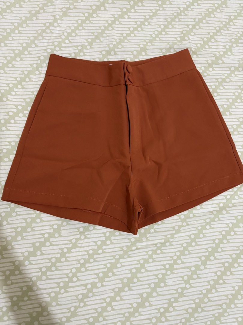 Lealea Studio Shorts - Bangkok (Category: Shorts) located in San Pablo. Submitted by jesicamargallo (Listing ID 1469465969, Image 1). Description: - Brand: Lealea Studio (Model: Cayla) - Color: Rusty orange - Condition: Brand new, still sealed in original packaging with size sticker - Waist: High-waisted with double button closure Size: XL (best fit for 31-32 waistline) RFS: size too big for me.