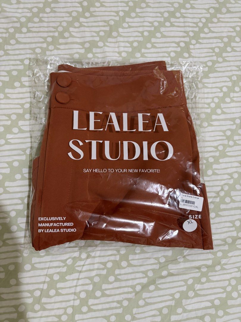 Lealea Studio Shorts - Bangkok (Category: Shorts) located in San Pablo. Submitted by jesicamargallo (Listing ID 1469465969, Image 3). Description: - Brand: Lealea Studio (Model: Cayla) - Color: Rusty orange - Condition: Brand new, still sealed in original packaging with size sticker - Waist: High-waisted with double button closure Size: XL (best fit for 31-32 waistline) RFS: size too big for me.