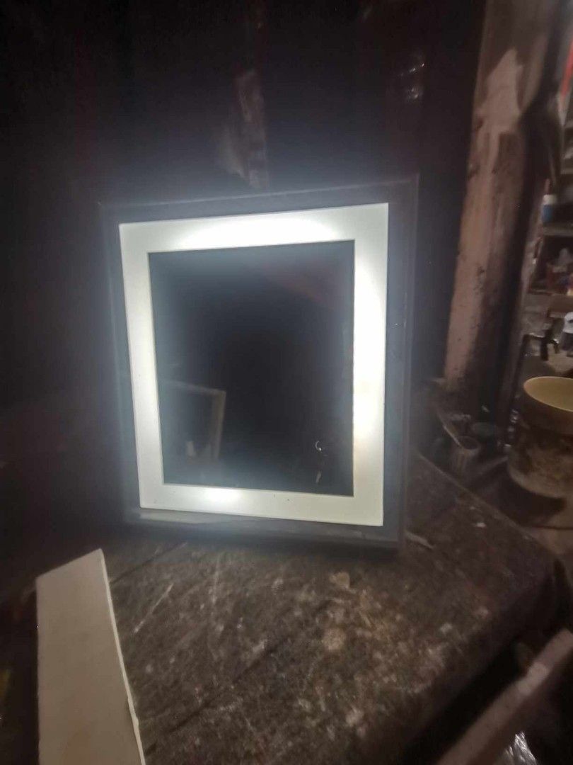 LED Lighted Vanity Mirror with Built-in Lighting (Category: Mirrors) located in Manila. Submitted by ronav25916562 (Listing ID 1469447984, Image 2). Description: - Rectangular LED makeup mirror - Bright integrated light border for even illumination - Built-in stand for desks and dressers - Standard plug-in power cord included.