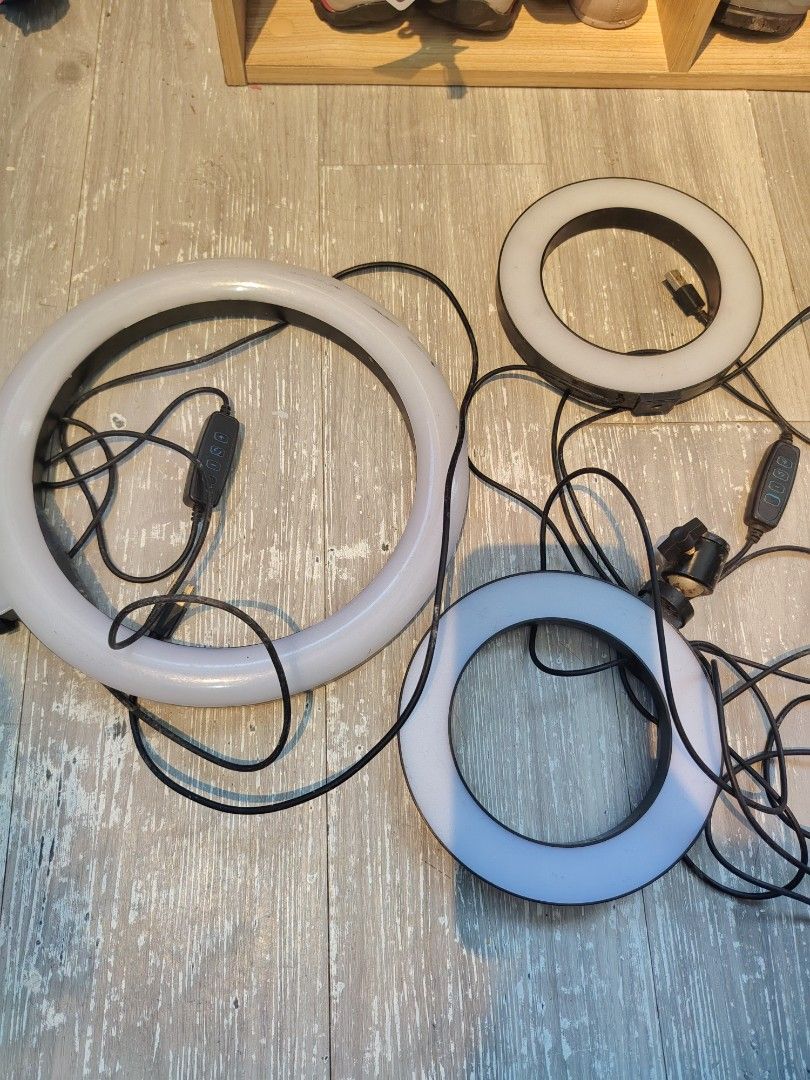 LED Ring Light with USB Cable and Control Switch (Category: Lighting & Studio Equipment) located in Makati City. Submitted by cess_preloved (Listing ID 1469497837, Image 2). Description: - Set of 3 LED ring lights in varying sizes - Bright white light output for flawless illumination - USB-powered with convenient inline control switches for power and brightness - Includes a mount bracket on one unit for easy setup - Ideal for content creation, vl