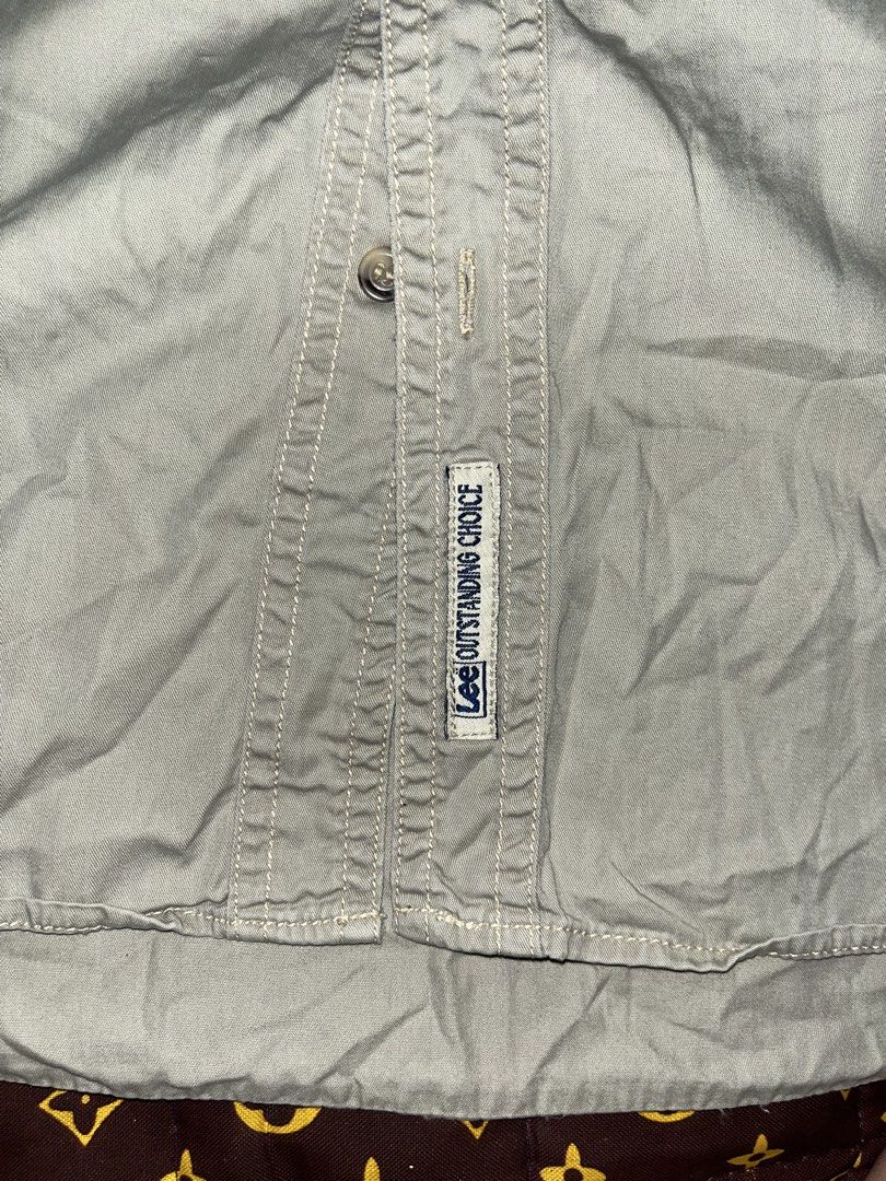 LEE "OUTSTANDING CHOICE" UTILITY WORK SHIRT (Category: Tshirts & Polo Shirts ) located in Manila. Submitted by becarria_thrift23 (Listing ID 1469484395, Image 2). Description: Solid vintage Lee button-down workwear/utility long sleeve shirt. Features clean contrast stitching and functional chest pockets Dual flap chest pockets JPG + 1 Black Lee pocket tab JPG + 1 Lower placket “Lee Outstanding Choice” woven patch JPG Durable double-needle contras