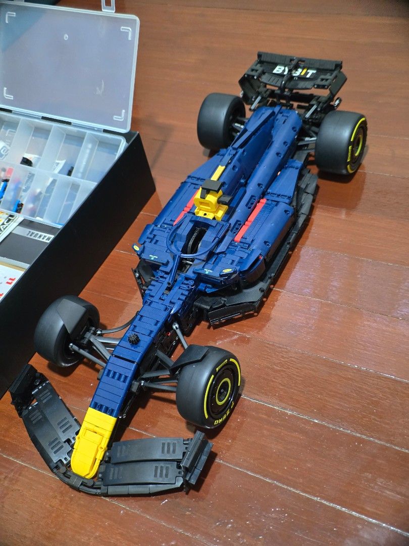 LEGO Technic Oracle Red Bull Racing RB18 Car (Category: Lego & Building Sets) located in Manila. Submitted by anton815 (Listing ID 1469451048, Image 2). Description: -Rastar 1:8 Red Bull -Licensed F1 building blocks Counterpart of lego technic -Built and displayed -Originally Php 8,999 -Complete parts, no broken or glued parts -Some stickers placed -1 step in building the spoiler was missed but can figured out in the manual however I have no time