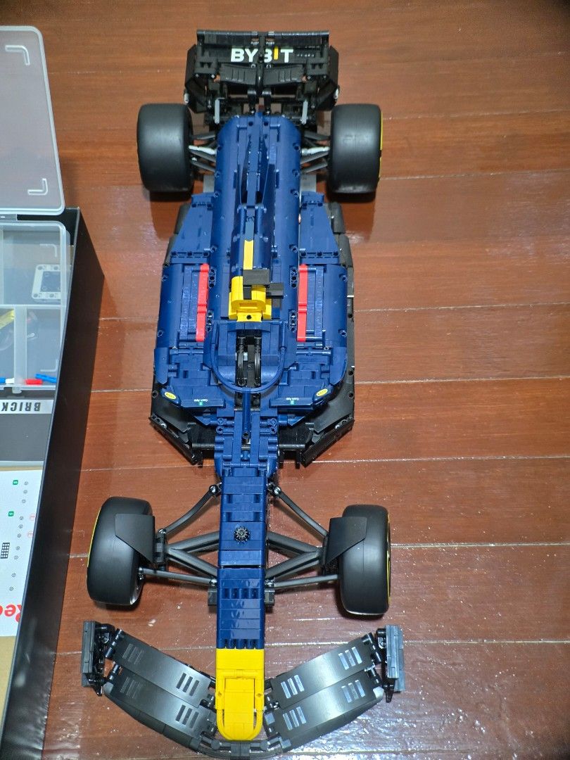 LEGO Technic Oracle Red Bull Racing RB18 Car (Category: Lego & Building Sets) located in Manila. Submitted by anton815 (Listing ID 1469451048, Image 1). Description: -Rastar 1:8 Red Bull -Licensed F1 building blocks Counterpart of lego technic -Built and displayed -Originally Php 8,999 -Complete parts, no broken or glued parts -Some stickers placed -1 step in building the spoiler was missed but can figured out in the manual however I have no time