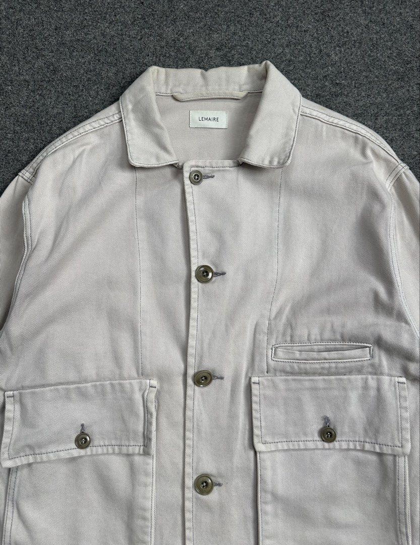 LEMAIRE - Boxy Denim Jacket Snow Gray (Category: Coats, Jackets and Outerwear) located in Manila. Submitted by scissor.2fifthy (Listing ID 1469527841, Image 2). Description: LEMAIRE - Boxy Denim Jacket Snow Gray Tagged size: Small fit Large (see measurement) Made in Morocco Material: 100% Cotton 85/100 condition rate Used Flaw: Minor sign of usage some yellowish stain Very presentable Check all photos for more details and information Dimensions L
