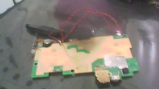Lenovo Ideatab a1000 Motherboard (Category: Android) located in Taguig. Submitted by mindy184293 (Listing ID 1469492605, Image 2). Description: - Item: Mobile phone circuit board with attached speaker module - Features: Micro USB port, audio jack, and soldered microchips - Condition: Pulled from a disassembled phone, sold strictly as parts or repair - Warranty: No guarantees on functionality. - for parts only..