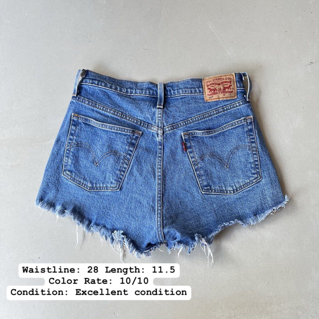 Levi's 501 Cut-off Denim Shorts (Category: Shorts) located in Mandaue City. Submitted by chinsyap_03 (Listing ID 1469468320, Image 1). Description: - Brand: Levi's 501 - Style: Denim shorts with raw frayed hems - Color: Classic medium blue wash - Details: Button fly closure, back patch pockets, iconic leather waist patch - Measurements: 28-inch waist, 11.5-inch length - Condition: Great wardrobe staple, perfect for warm weather.