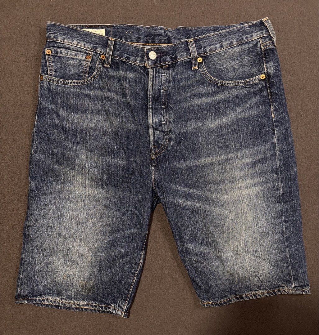 Levi's 501 Denim Shorts Size 34 (Category: Shorts) located in Mabalacat. Submitted by _limitlessfashion (Listing ID 1469419301, Image 1). Description: - Brand: Levi's 501 - Style: Denim shorts / Cut-offs - Color: Classic blue wash with natural fading - Size: 34-36 - Length 22 - Hem 9.5 - Color may vary due to lighting - Color rate & Condition 9.5 - No major issue, need wash only - Details: Button fly closure, 5-pocket layout, signature leather ba