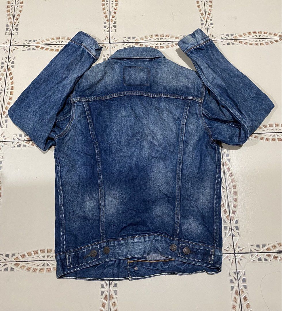 Levis denim truck jacket (Category: Coats, Jackets and Outerwear) located in Cebu City. Submitted by hustler_69 (Listing ID 1469430251, Image 2). Description: Levis denim truck jacket Size small 19 width 24 length Excellent condition Details are all posted.