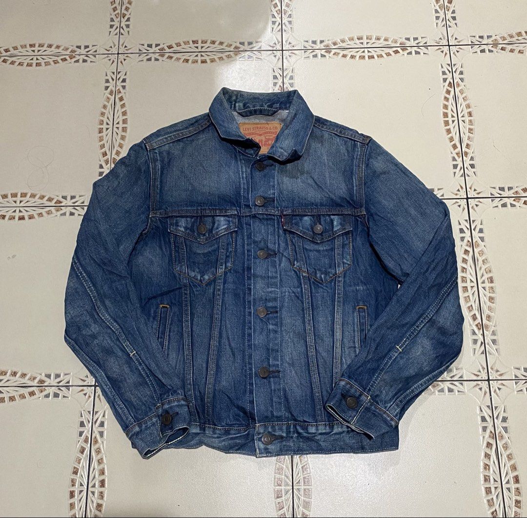 Levis denim truck jacket (Category: Coats, Jackets and Outerwear) located in Cebu City. Submitted by hustler_69 (Listing ID 1469430251, Image 1). Description: Levis denim truck jacket Size small 19 width 24 length Excellent condition Details are all posted.