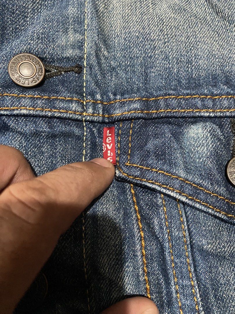 Levis denim truck jacket (Category: Coats, Jackets and Outerwear) located in Cebu City. Submitted by hustler_69 (Listing ID 1469430251, Image 3). Description: Levis denim truck jacket Size small 19 width 24 length Excellent condition Details are all posted.