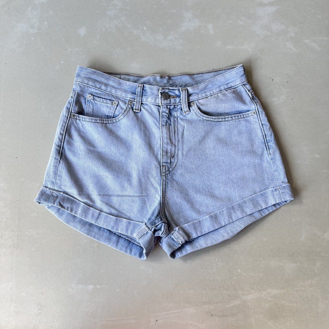 Levi's Light Wash Denim Cuffed Shorts (Category: Shorts) located in Mandaue City. Submitted by chinsyap_03 (Listing ID 1469468278, Image 2). Description: - Brand: Levi's - Style: High-waisted denim shorts with cuffed hem and button fly - Wash: Light wash with classic leather patch and back pockets - Measurements: Waist 28 inches, Length 12.6 inches - Condition: Clean fabric, excellent warm-weather staple.