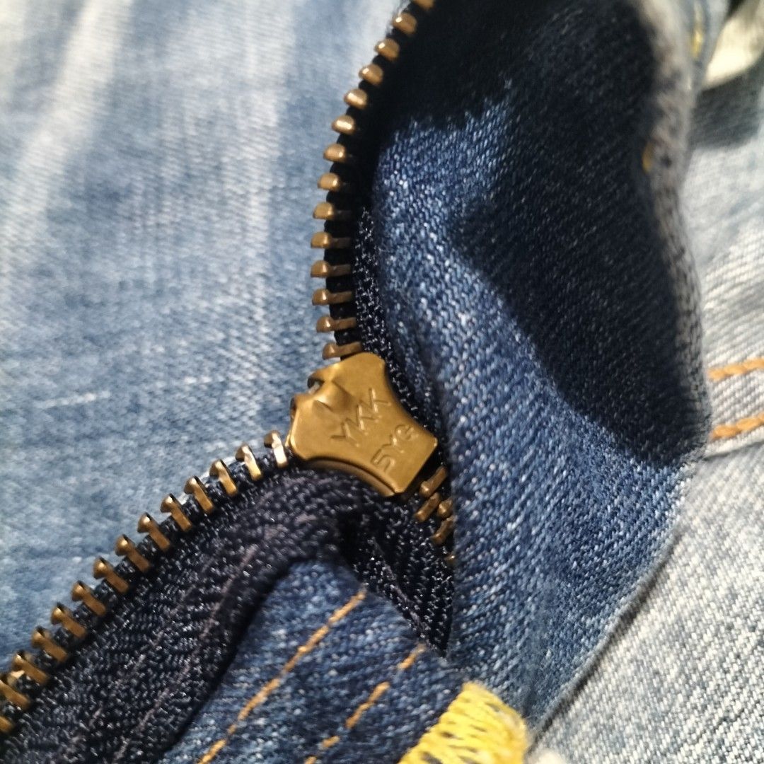 Levi's Made In Japan Jeans (Category: Jeans) located in Taytay. Submitted by calmtree-6248 (Listing ID 1469536092, Image 3). Description: - Authentic Levi's denim jeans crafted in Japan - Medium wash blue featuring stylish whiskering and fading - Classic 5-pocket styling with a secure button fly - Branded hardware and smooth functionality - Unique pocket lining with special 'Made in Japan' text and graphic prints - Interior tags include global co