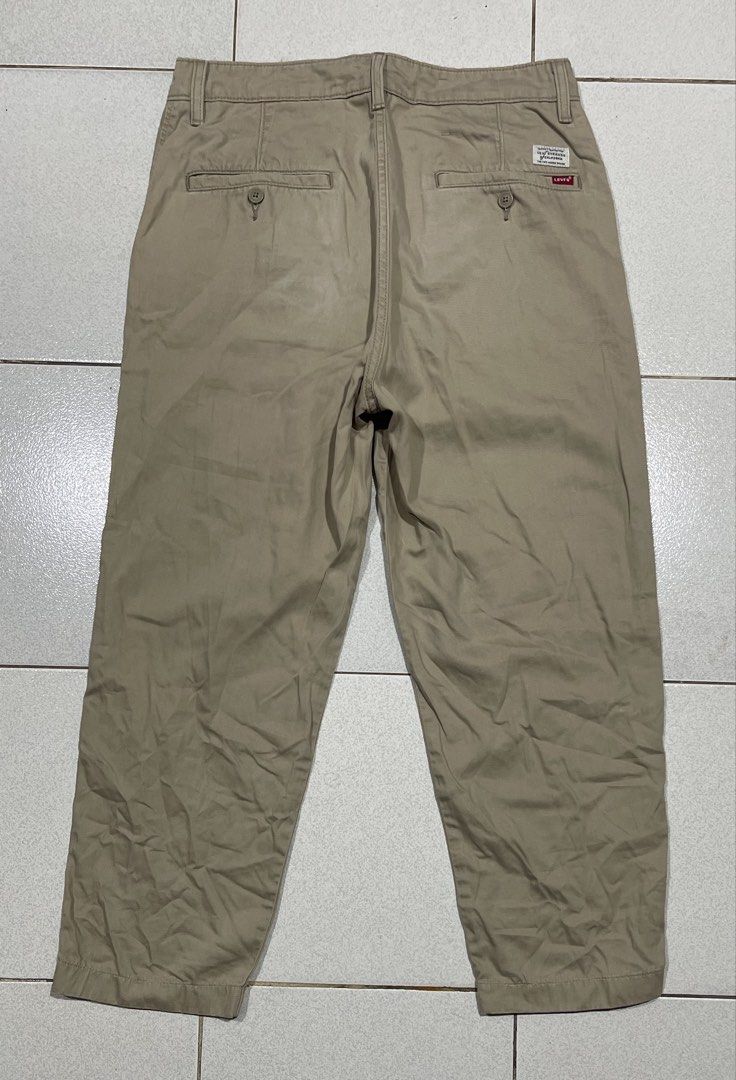 Levis XX Chino Pants (Category: Chinos) located in Mandaue City. Submitted by MJ_80 (Listing ID 1469416187, Image 2). Description: Mens Levis XX Chino Stay Loose Tapered Crop Pants Size 30 on tag Fits 30-31 Waist See photos for measurements Isseue : has light dot stain & faded at the back see last photo Color rate & Condition: 9.3/10 Price : 1,250.