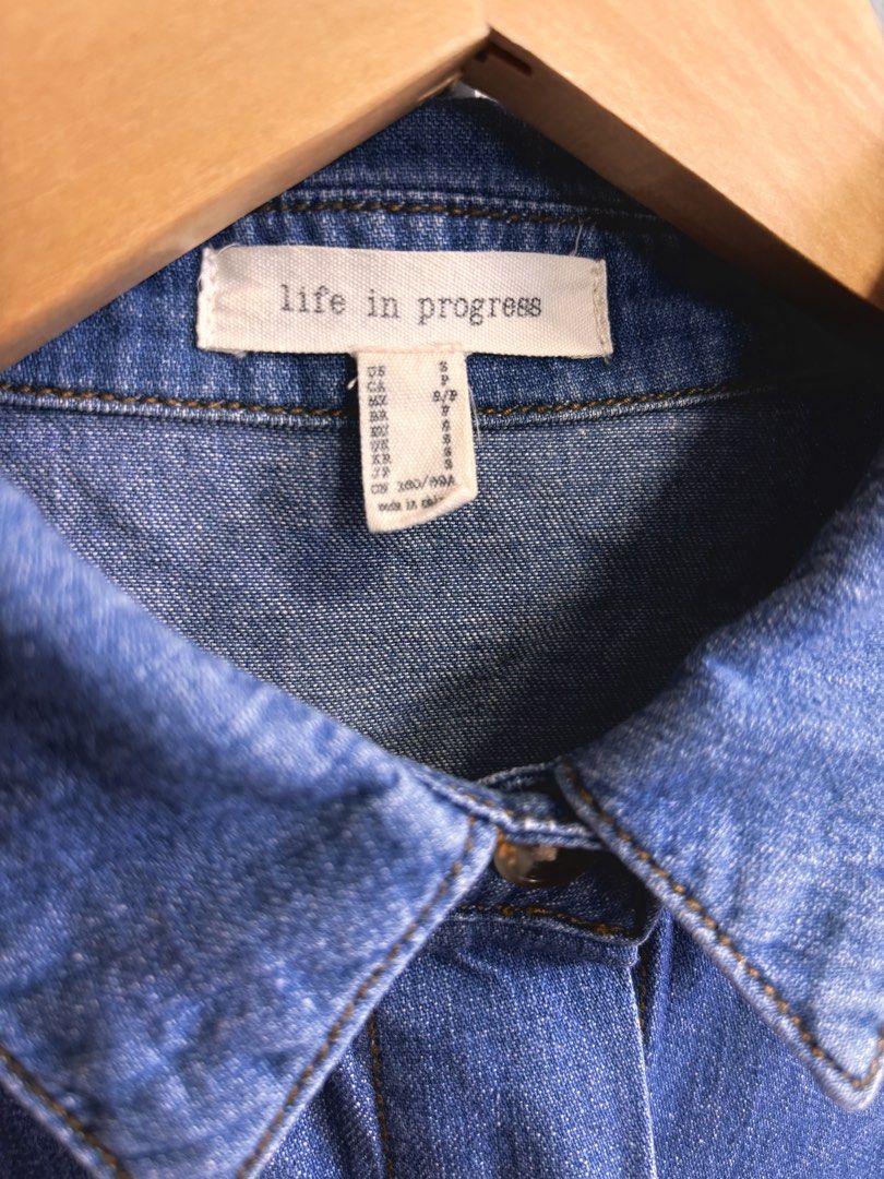 Life in Progress Denim Short Sleeve Button Up Shirt (Category: Shirts) located in Las Pinas. Submitted by tienda_ (Listing ID 1469403258, Image 3). Description: Life in Progress (H&M) Style: Blue denim short sleeve shirt Closure: Button-up with hidden placket Details: Left chest pocket, classic collar, and stylish hem stitching .