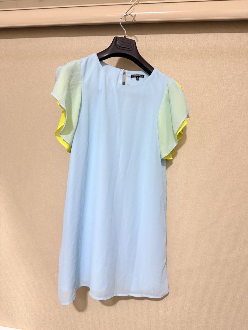 Light Blue Mini Dress With Yellow Flutter Sleeves (Category: Dresses) located in Cavite. Submitted by mgd.blessed (Listing ID 1469435843, Image 1). Description: -from US - Color: Light blue with light green and bright yellow layered flutter sleeves - Material: Lightweight, breathable chiffon - Design: Round neckline with back button closure and a flowy fit - Style: Simple, bright, and chic - Occasion: Great for warm weather, casual outings, or da