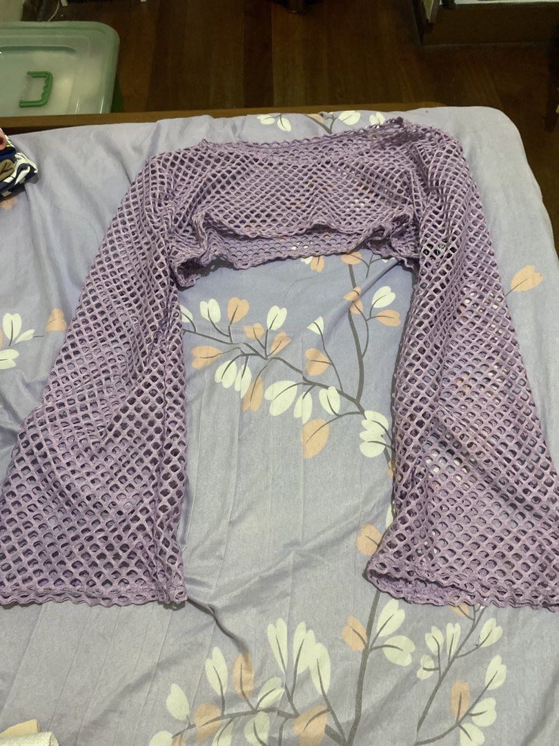 Light purple fishnet mesh long sleeve crop top (Category: Longsleeves) located in Pasig City. Submitted by alaineeeee (Listing ID 1469514833, Image 1). Description: - Color: Lilac purple - Style: Open-front fishnet mesh shrug with long sleeves and flared cuffs - Fit: Super stretchy knit fabric - Condition: Worn once, still in great shape - Best for: Gigs, parties, casual street fits, and easy layering over camis or tanks.