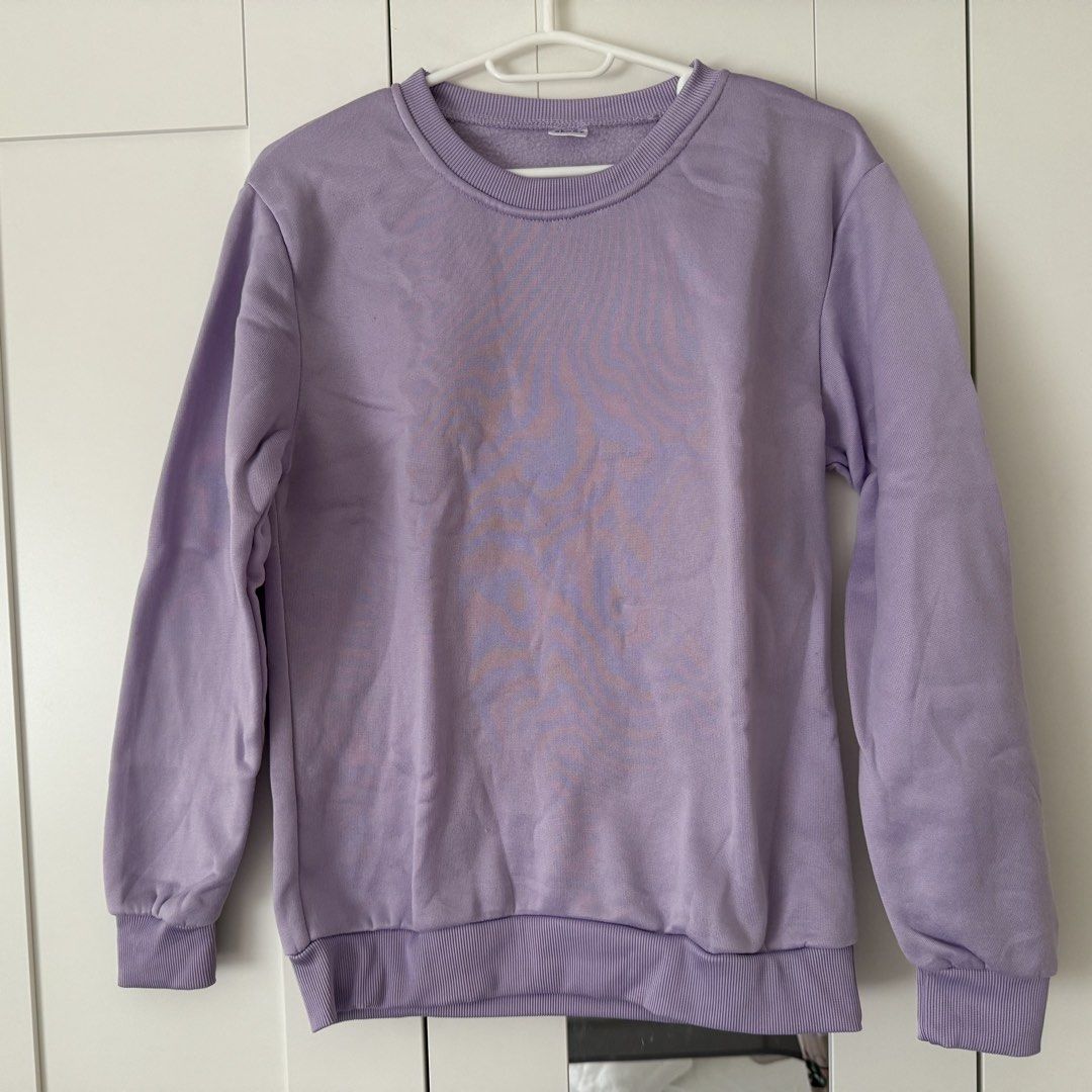 Lilac Purple Crewneck Winter Inner Layer Sweatshirt Long Sleeve Pullover (Category: Coats, Jackets and Outerwear) located in Marikina City. Submitted by lovegoeson (Listing ID 1469510455, Image 1). Description: - Inner material Fleece - Color: Pastel lilac purple - Style: Crewneck sweatshirt, standard fit pullover - Features: Long sleeves with ribbed cuffs and hem - Condition: Excellent, clean inside and out with no stains or marks - Perfect for: