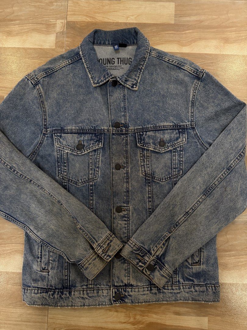 Limited Edition H&M Divided Young Thug Denim Jacket Collaboration (Category: Coats, Jackets and Outerwear) located in Manila. Submitted by epicmountain_93c71a (Listing ID 1469439494, Image 2). Description: Brand: Limited Edition H&M Divided x Young Thug Merchandise Collaboration Size: Medium (175/100A, Standard Fit) Design: Eye-catching large cherub graphic with flower bouquet and UK cities on the back Details: Distressed design, Classic button-u