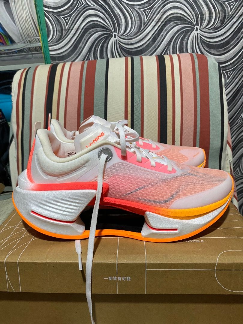Li-Ning Shadow 3 Essential Running Shoes US 9 (Category: Sneakers) located in Caloocan City. Submitted by braveeagle.908db8 (Listing ID 1469411341, Image 1). Description: - Brand/Model: Li-Ning Shadow 3 Essential - Colorway: Pink, white, and bold orange accents - Size: US 9 / EUR 42 2/3 - Features: Lightweight high-rebound racing design with unique hollow midsole cushioning - Upper: Breathable mesh for ultimate comfort - Inclusions: Comes with or