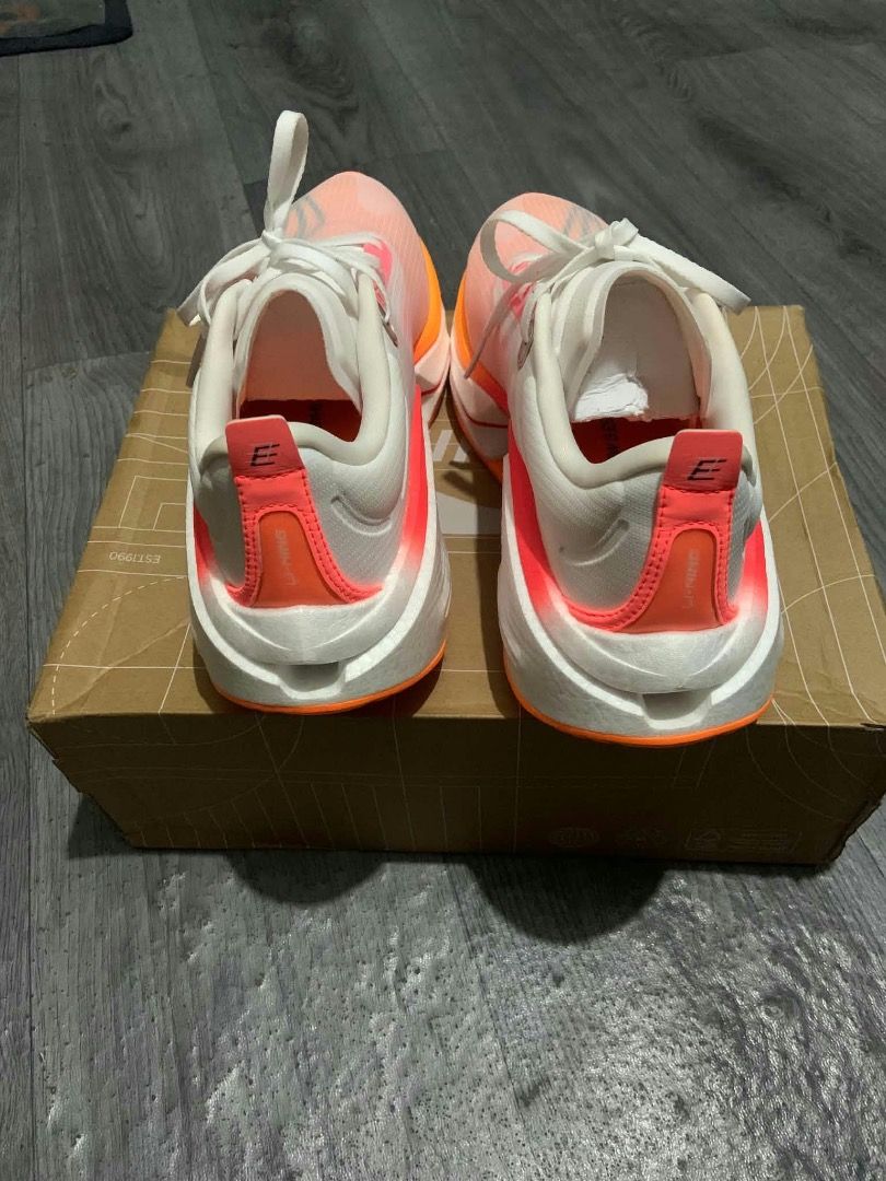 Li-Ning Shadow 3 Essential Running Shoes US 9 (Category: Sneakers) located in Caloocan City. Submitted by braveeagle.908db8 (Listing ID 1469411341, Image 3). Description: - Brand/Model: Li-Ning Shadow 3 Essential - Colorway: Pink, white, and bold orange accents - Size: US 9 / EUR 42 2/3 - Features: Lightweight high-rebound racing design with unique hollow midsole cushioning - Upper: Breathable mesh for ultimate comfort - Inclusions: Comes with or