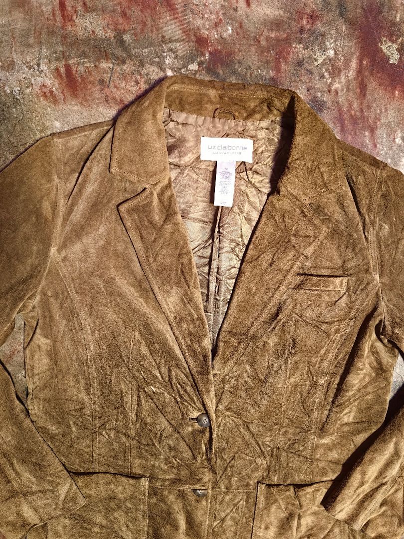 Liz Claborne Brown Suede Blazer Jacket (Category: Coats, Jackets and Outerwear) located in Tarlac. Submitted by jeremiah.curator.2026 (Listing ID 1469397215, Image 3). Description: - Brand: Liz Claborne - Material: Brown suede - Color: Warm camel brown - Closure: Two front buttons - Pockets: Lower patch pockets - Details: Classic collar, textured inner lining, long sleeves - Fit: Regular fit.