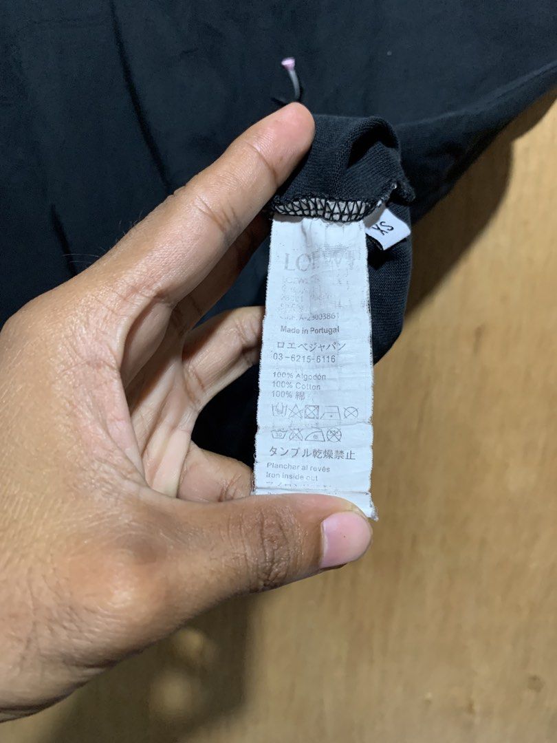 Loewe Oversized Shirt (Category: Tshirts & Polo Shirts ) located in Cebu City. Submitted by handpickedxthrift (Listing ID 1469409344, Image 3). Description: Loewe Oversized Shirt👀 Heavy Cotton Excellent 21 x 26 Cut neck tag Color rate 9.8/10 DM interested📩.