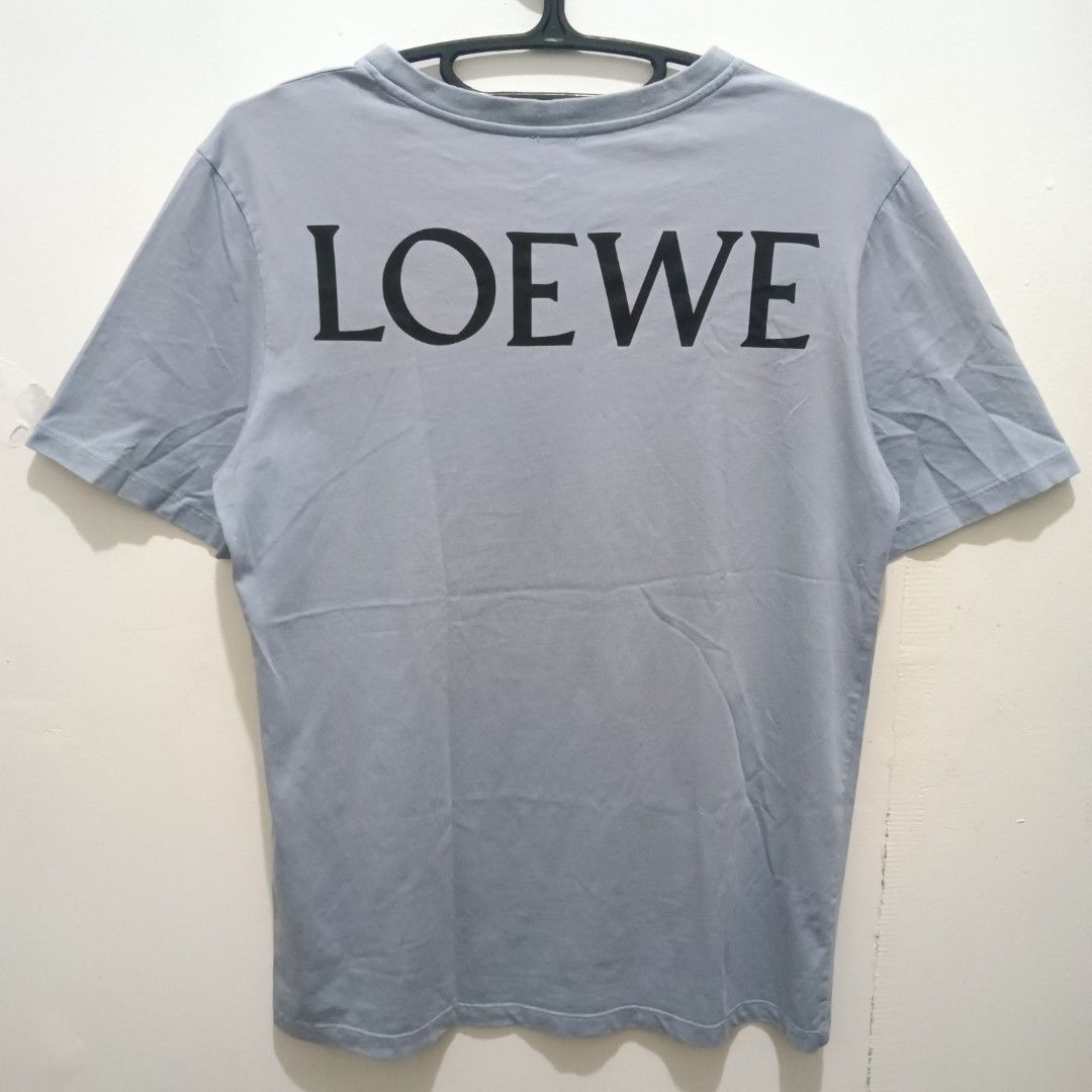 LOEWE x DISNEY Dumbo Collab Shirt (Category: Shirts) located in Caloocan City. Submitted by jaychingsss (Listing ID 1469497374, Image 1). Description: Loewe x Disney Collab Shirt - 120 18.5x26 Color Rate: 9/10 With Washtag pero faded na, Cut Necktag NEED WASH.