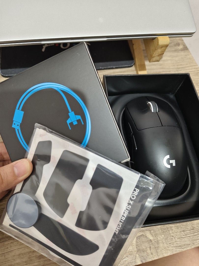 Logitech G Pro X Superlight Wireless Gaming Mouse (Category: Mouse & Mousepads) located in Manila. Submitted by pquvalerio51208 (Listing ID 1469530167, Image 1). Description: Logitech G Pro X Superlight wireless gaming mouse in black. Original box included, plus unused grip tape and charging cable. Zero hassle setup. Ultra lightweight design for fast flicks and tracking. Battery holds charge well. Clean matte finish..