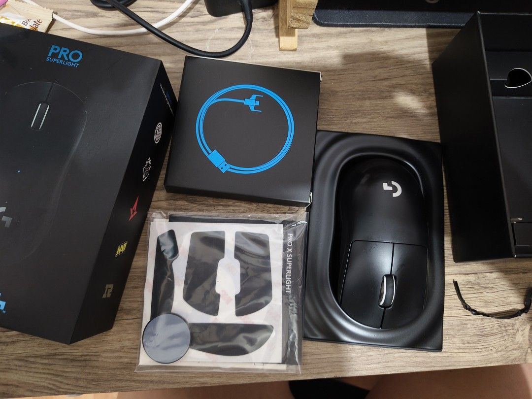 Logitech G Pro X Superlight Wireless Gaming Mouse (Category: Mouse & Mousepads) located in Manila. Submitted by pquvalerio51208 (Listing ID 1469530167, Image 2). Description: Logitech G Pro X Superlight wireless gaming mouse in black. Original box included, plus unused grip tape and charging cable. Zero hassle setup. Ultra lightweight design for fast flicks and tracking. Battery holds charge well. Clean matte finish..