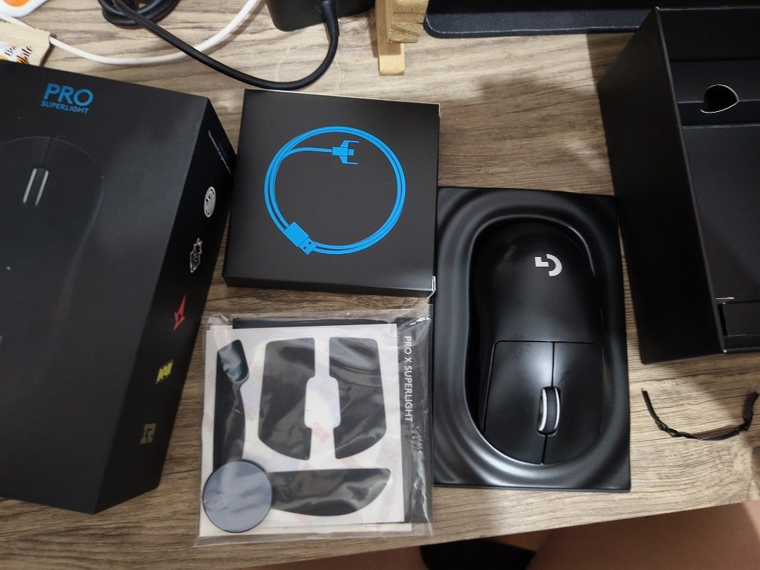 Logitech G Pro X Superlight Wireless Gaming Mouse (Category: Mouse & Mousepads) located in Manila. Submitted by pquvalerio51208 (Listing ID 1469530167, Image 3). Description: Logitech G Pro X Superlight wireless gaming mouse in black. Original box included, plus unused grip tape and charging cable. Zero hassle setup. Ultra lightweight design for fast flicks and tracking. Battery holds charge well. Clean matte finish..