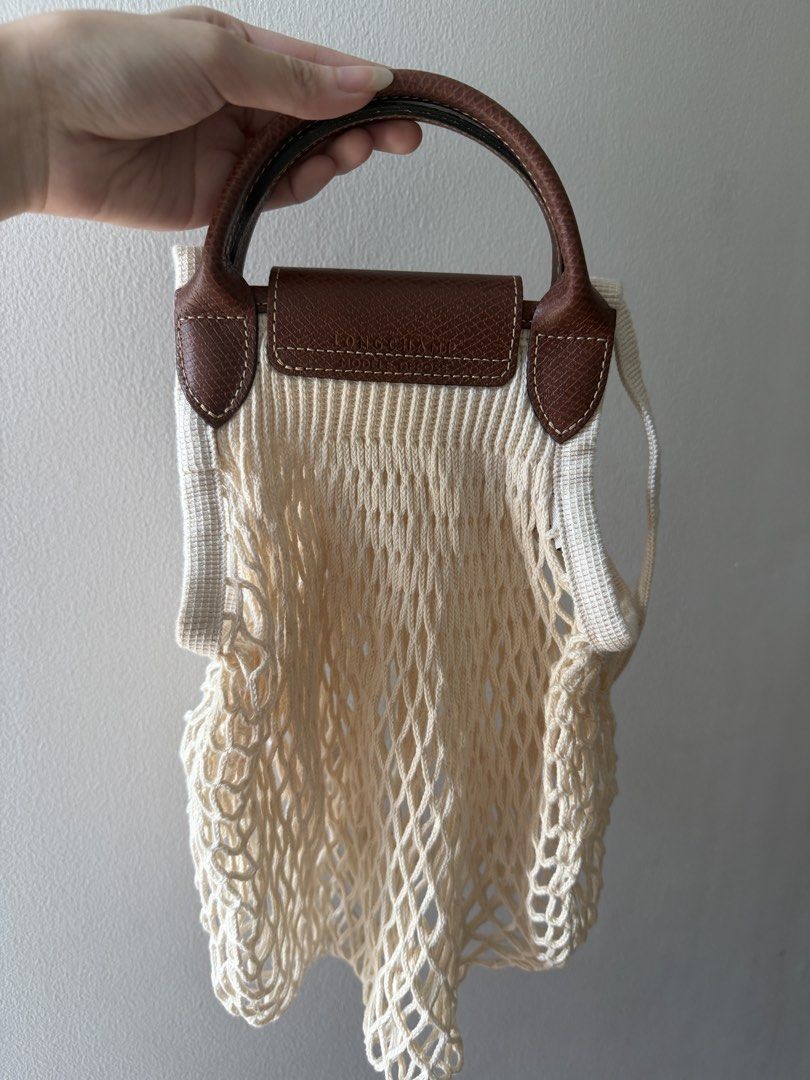 Long champ Le Pliage Filet L mesh bag (Category: Luxury Bags & Wallets) located in Taal. Submitted by yanniyana (Listing ID 1469439186, Image 2). Description: on hand and brand new.