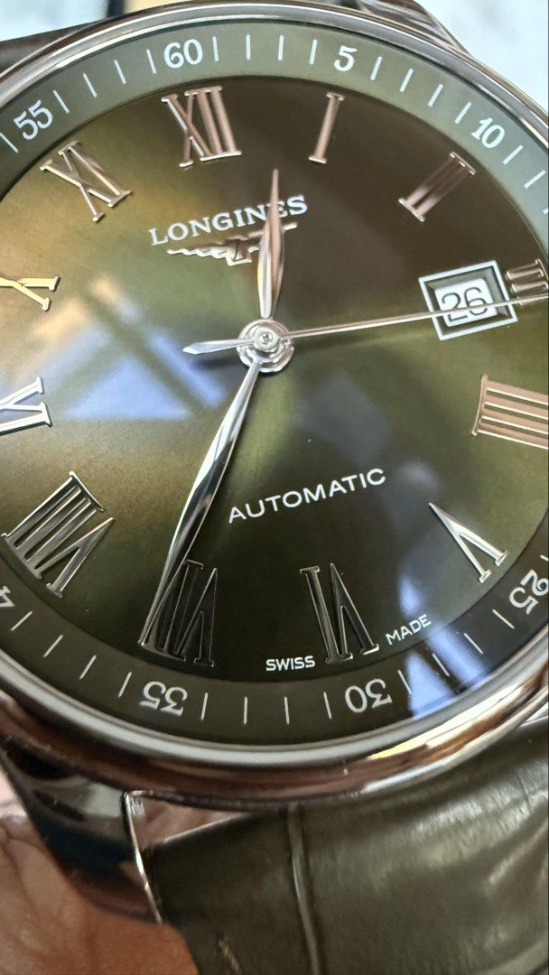 Longines Master Collection L2.793.4.09.2 (Category: Luxury Watches) located in Makati City. Submitted by the_ambitious_peasant (Listing ID 1469499230, Image 3). Description: - Brand/Model: Longines Master Collection L2.793.4.09.2 - Movement: Automatic movement with exhibition case back - Dial: Striking green dial with classic Roman numerals and date window at 3 o'clock - Case: Durable stainless steel case - Strap: Textured green leather strap wit