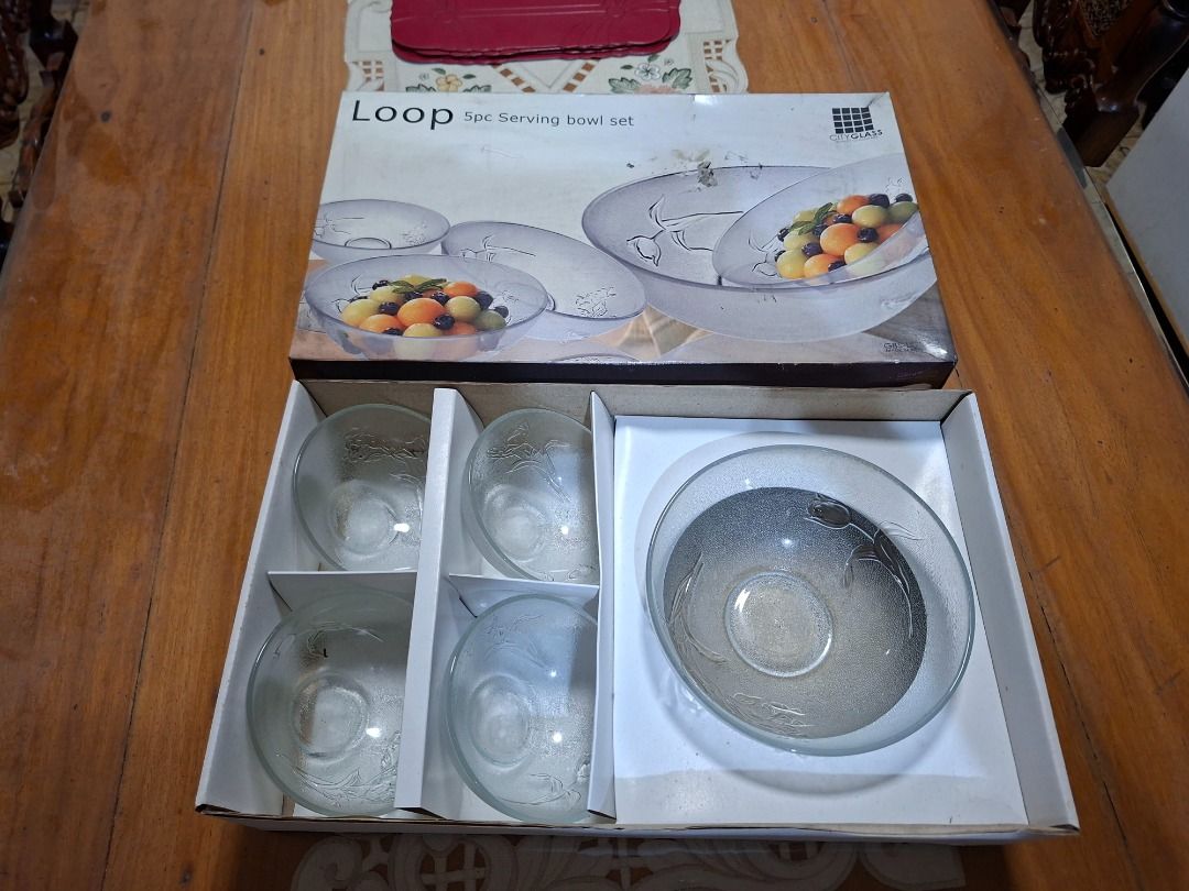 Loop 5pc Frosted Glass Serving Bowl Set (Category: Dinnerware & Cutlery) located in Taguig. Submitted by d_man11 (Listing ID 1469462363, Image 2). Description: - Set includes 1 large central bowl and 4 matching smaller bowls - Elegant frosted glass finish with a carved rose flower pattern - Ideal for serving salads, fruits, or desserts at family gatherings - Perfect condition, no scratches, no cracks - Comes in its original box and has been safel
