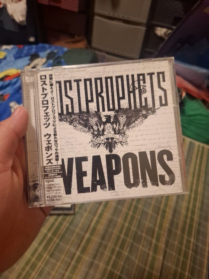 Lostprophets Weapons CD Album Japan Edition (Category: CDs & DVDs) located in San Jose del Monte. Submitted by youweiner48495 (Listing ID 1469395829, Image 1). Description: - Artist/Album: Lostprophets - Weapons - Edition: Japanese Edition complete with OBI strip - Condition: Clean disc, plays great; case and inserts in solid shape - Includes: Deluxe edition bonus tracks and bonus videos - Key Tracks: Bring 'Em Down, We Bring An Arsenal, Another 