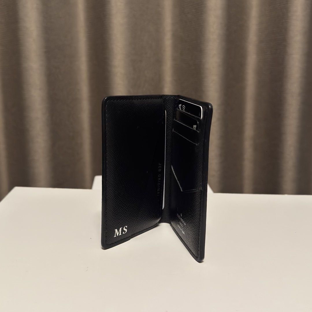Louis Vuitton black cardholder (Category: Wallets & Card Holders) located in Quezon City. Submitted by hintstreet (Listing ID 1469447901, Image 2). Description: .