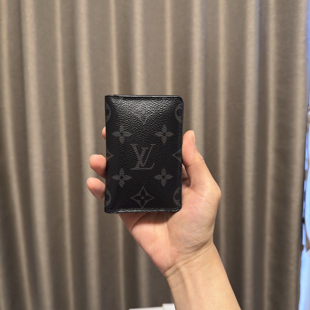 Louis Vuitton black cardholder (Category: Wallets & Card Holders) located in Quezon City. Submitted by hintstreet (Listing ID 1469447901, Image 3). Description: .