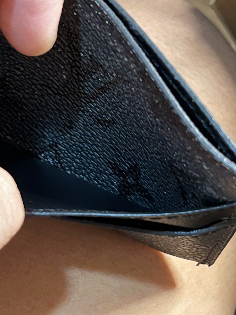 Louis Vuitton Black Leather Card Holder (Category: Luxury Bags & Wallets) located in Gapan. Submitted by lunashop14 (Listing ID 1469400018, Image 3). Description: As you can see may white na siya yun lang issue sa katagalan na siguro pero still ok pa naman matibay. Mag offer na lang po kayu for the last price thank you. - Authentic Louis Vuitton card holder in black textured leather - Multiple card slots on both sides for easy organization - Comp